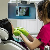 Dental assistant capturing smile images