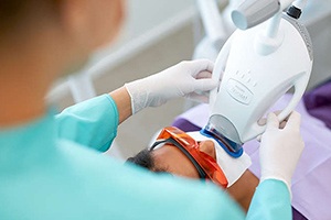 Patient receiving teeth whitening