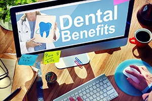 Looking up dental benefits on the computer