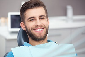 Male dental patient visiting emergency dentist in Lakewood, CO
