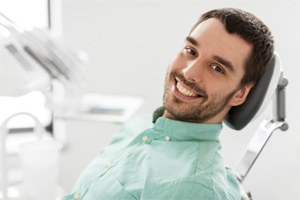 Man smiling after Opus laser treatment in Lakewood, CO