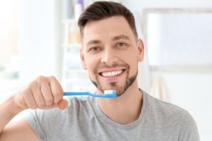 Man brushing teeth