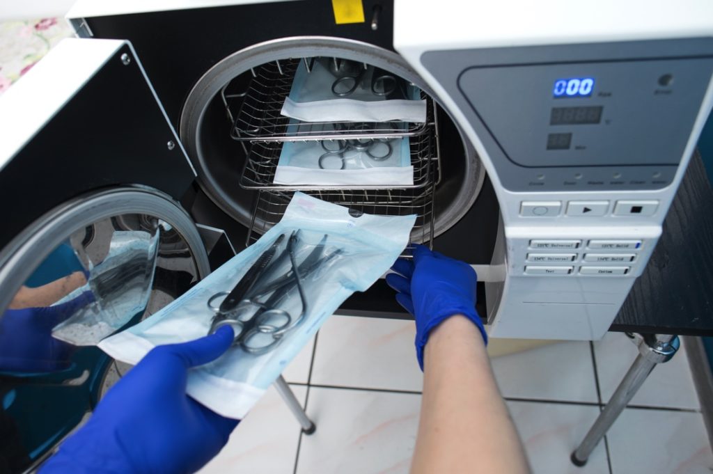 Dentist in Lakewood using an autoclave