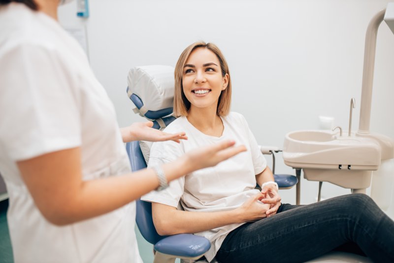 woman smiling at the dentist