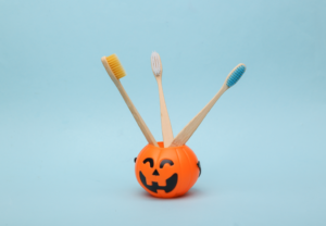 a pumpkin-shaped toothbrush holder 