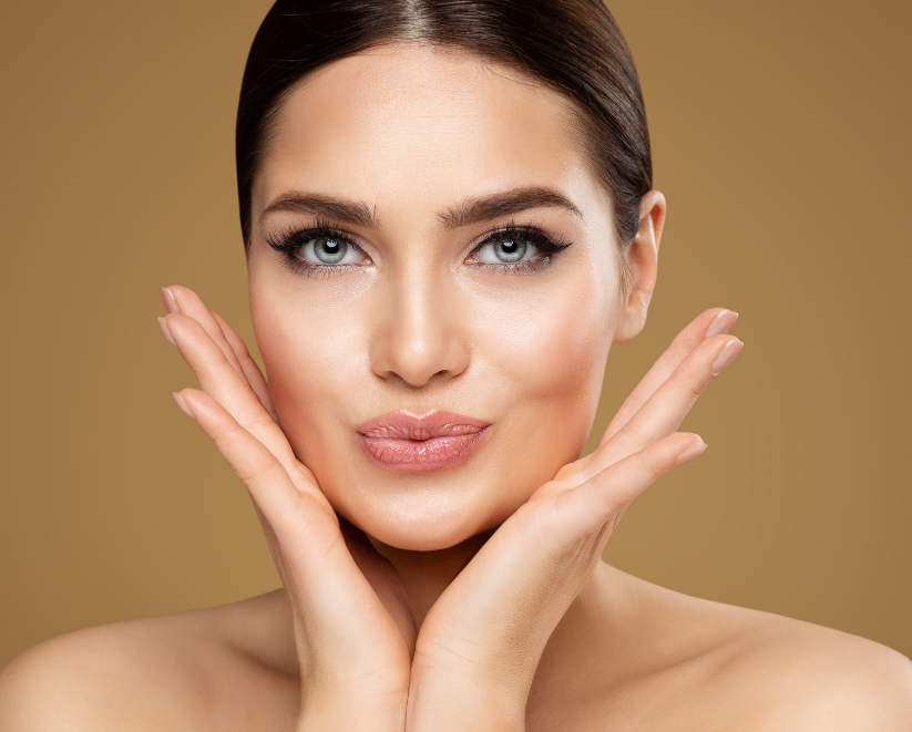 A woman smiling with dermal filler